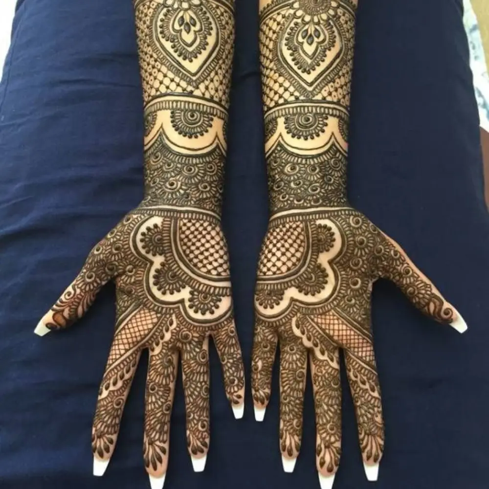 Full Hand Mehndi Design: Intricate Paisley Patterns